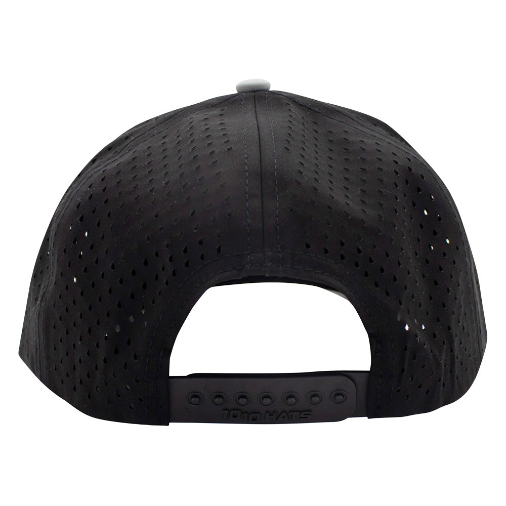 A perforated canvas back of a black cap with 'Richardson' branding on the snapback closure.