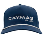 A blue cap with a white 'Caymas Boats' logo and a white rope across the bill.
