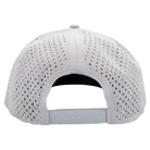 White baseball cap with a perforated design and a snap back closure.