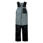 A pair of technical outdoor bib overalls in light gray and black, featuring a front zipper, multiple utility pockets, and shoulder straps, shown against a plain white background.