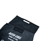 Close up of the mesh interior of a black weigh-in bag.