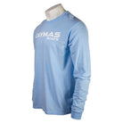 Side of a light blue long-sleeve shirt with a white 'Caymas Boats' logo on the chest. 