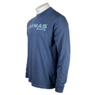 Side of a blue long-sleeve shirt with 'Caymas Boats' logo in teal on the chest. 