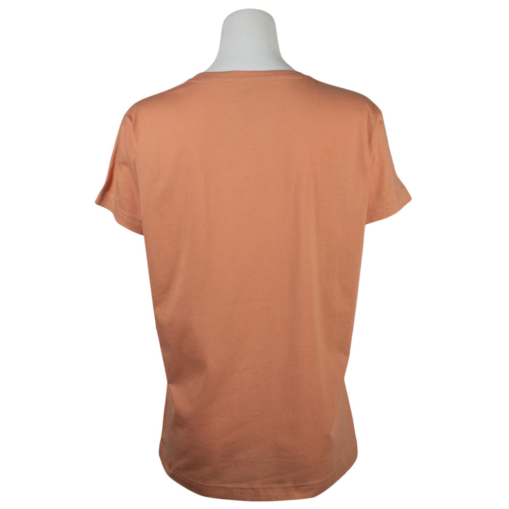 Back of a light orange ladies tee.