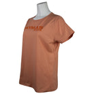Side of a light orange t-shirt with a dark orange 'Caymas Boats' logo on the chest.