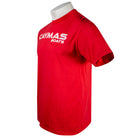 Side of a red t-shirt with a white 'Caymas Boats' logo on the chest.